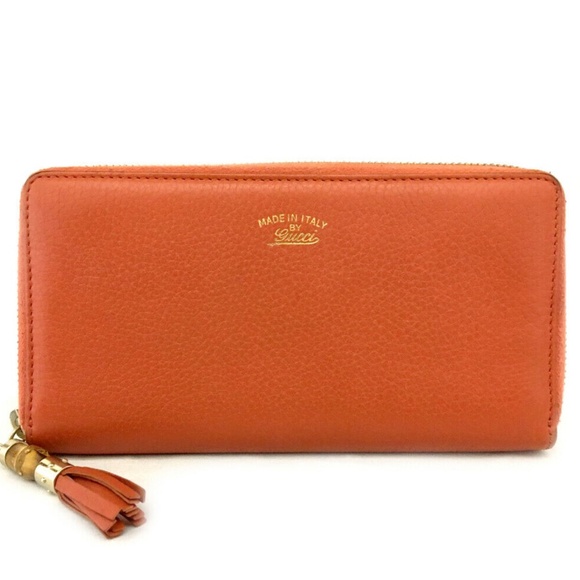Gucci Handbags - GUCCI Leather & Bamboo Fringe Zippy Wallet